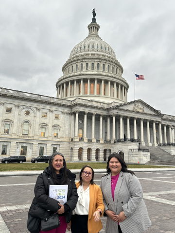 Liana, Kaying, and Victoria in front of the U.S. Capitol. 